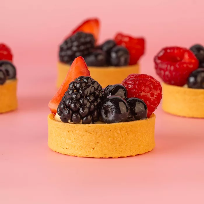 Fresh fruit tarts prepared for a catered dessert table